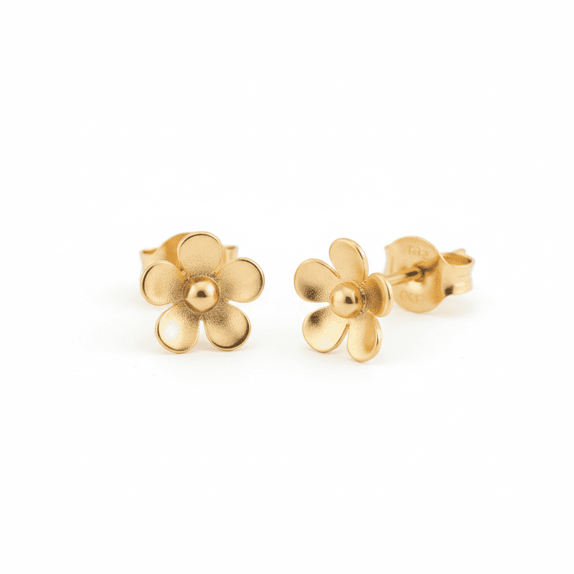 Delicate gold plated floral stud earrings on white background